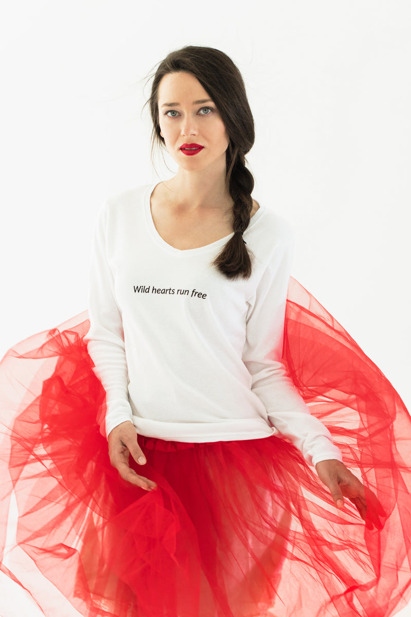 Inspirational clothing for women. A woman wears a slogan t-shirt.