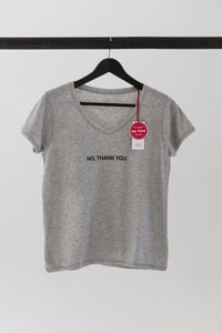 high-quality inspirational t-shirt grey saying: NO THANK YOU hangs on a hanger 