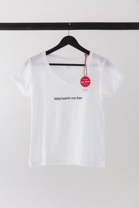 premium quality slogan t-shirt white saying: Wild Hearts Run Free