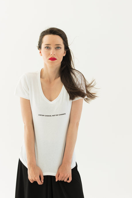 woman wears a high-quality inspirational t-shirt white saying: Live by Choice not by Chance