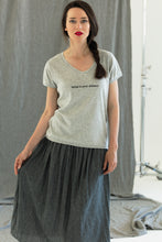 Load image into Gallery viewer, woman wears a high-quality inspirational t-shirt grey saying: What is your dream? 