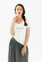 Load image into Gallery viewer, woman wears a premium quality slogan white t-shirt saying: What is your dream?