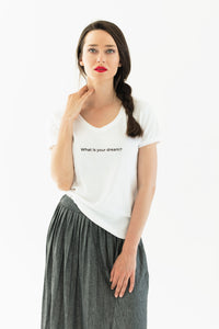 woman wears a premium quality slogan white t-shirt saying: What is your dream?