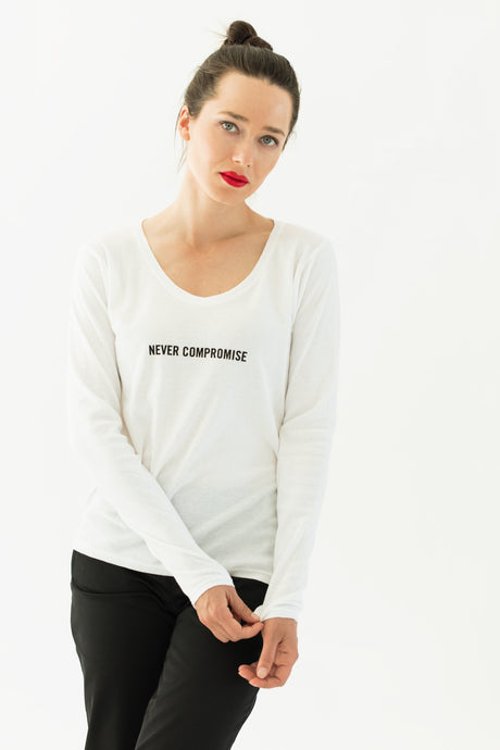 woman wears a premium quality slogan t-shirt white saying: Never Compromise