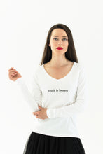 Load image into Gallery viewer, woman wears a premium quality slogan t-shirt white saying: Truth is Beauty